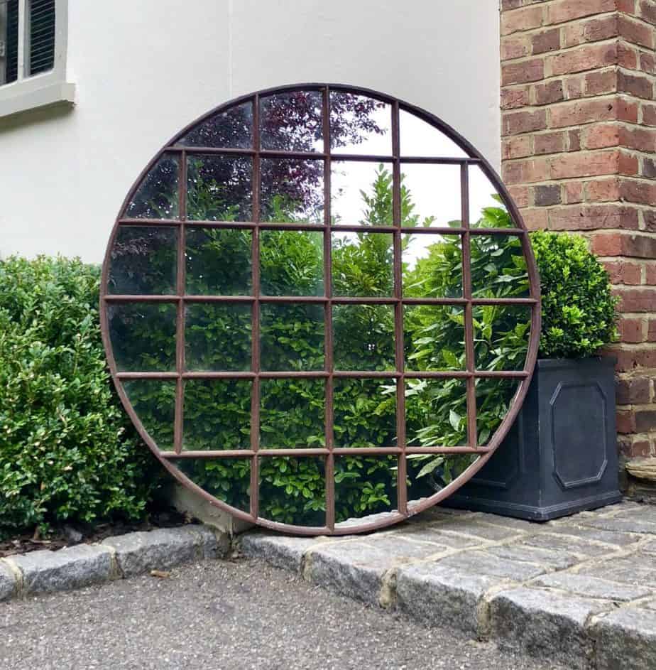 Round architectural garden mirror