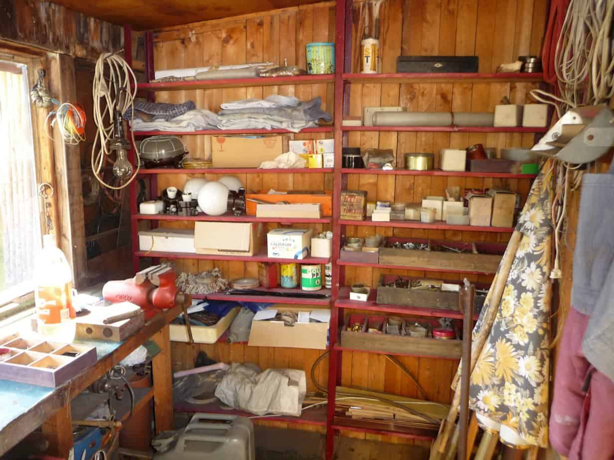 Inside a mini shed storage filled with stored items