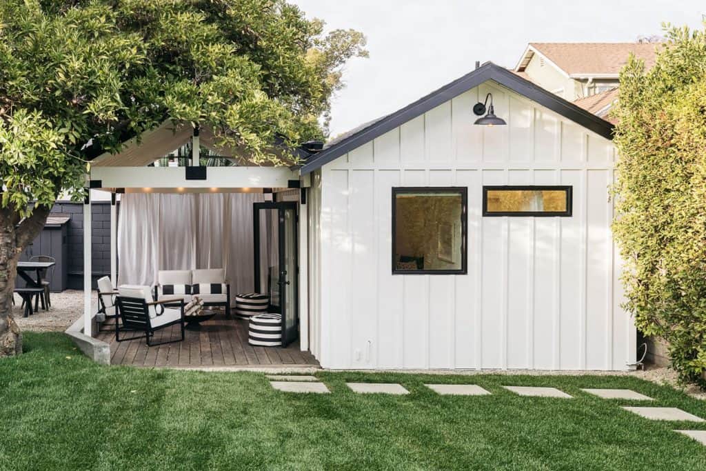 Metal shed with pathway and landscaping setting
