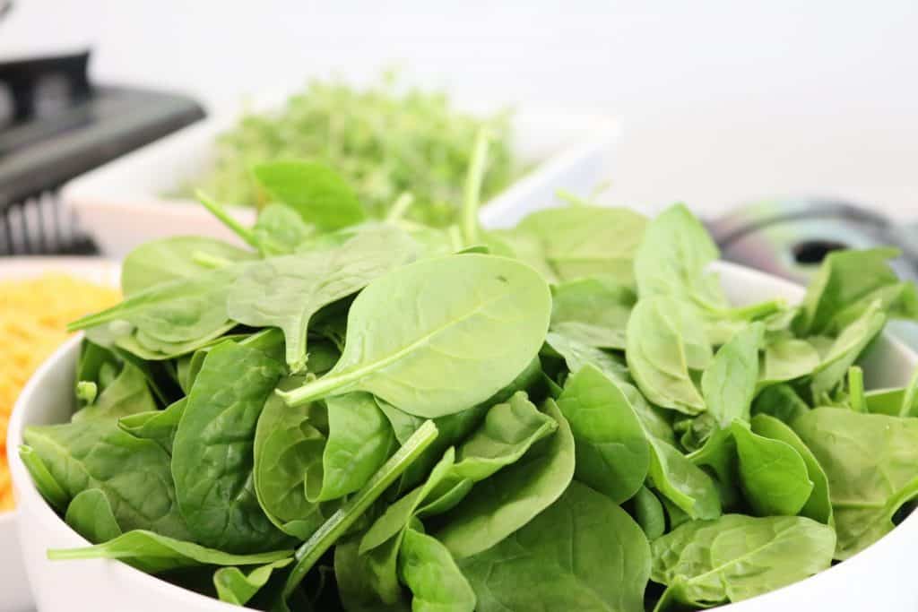Spinach leaves on a bowl