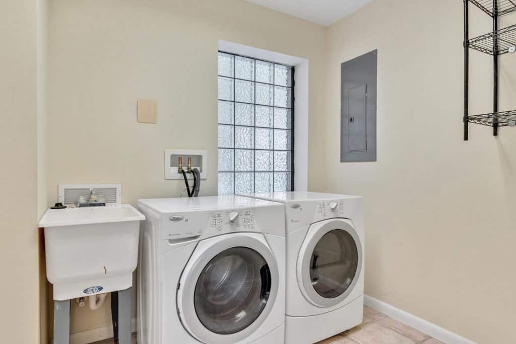 Laundry room with two washing machines