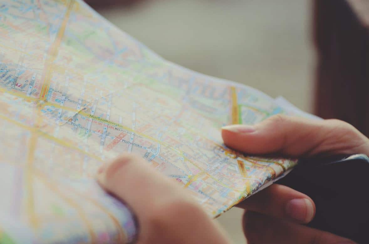 Person reading a map