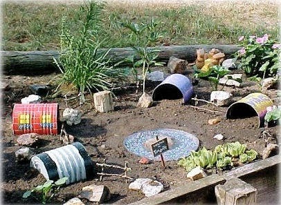 toad garden with tin cans