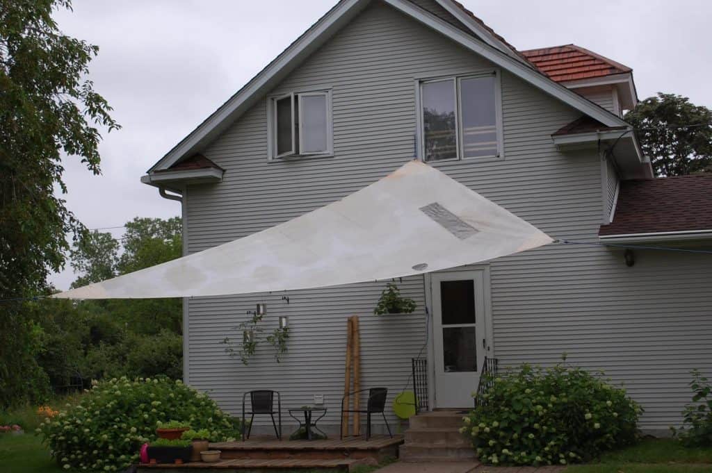 Old sail repurposed as sunshade