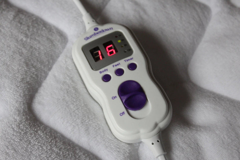 Heated blanket with temperature controller.