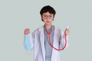 Child in doctor costume