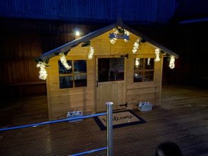 Playhouse at night with floral lights