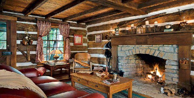 Insulated log cabin decorated with a variety of antiques