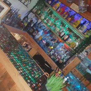 Homemade bar with a collection of alcoholic drinks