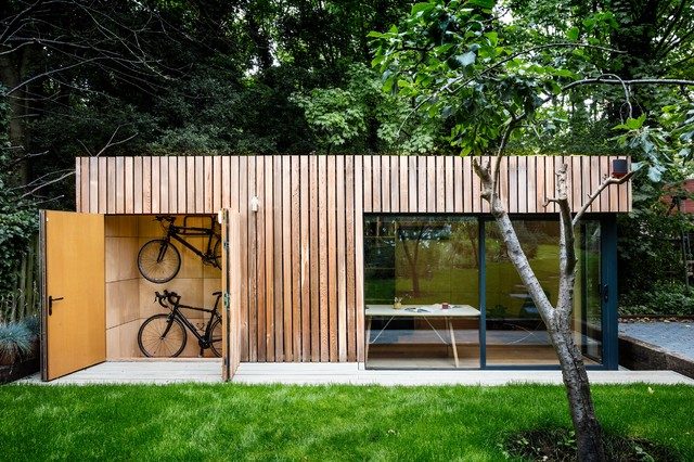 A garden room with secret storage for bikes