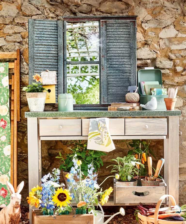 Mirror prop on a potting bench