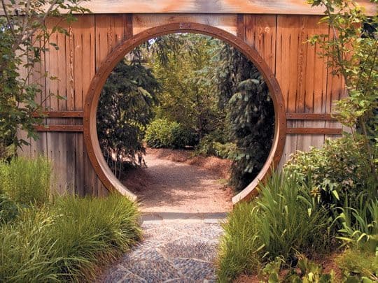 Mirror-like archway on a Japanese garden