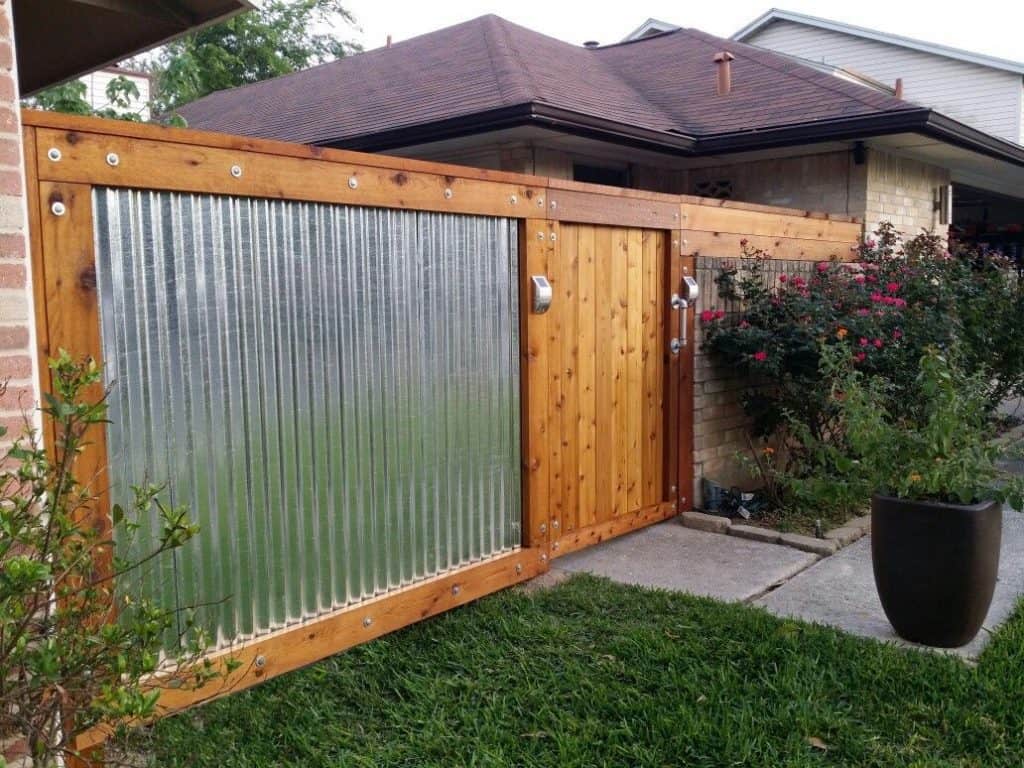 Wood and corrugated metal combined garden fence