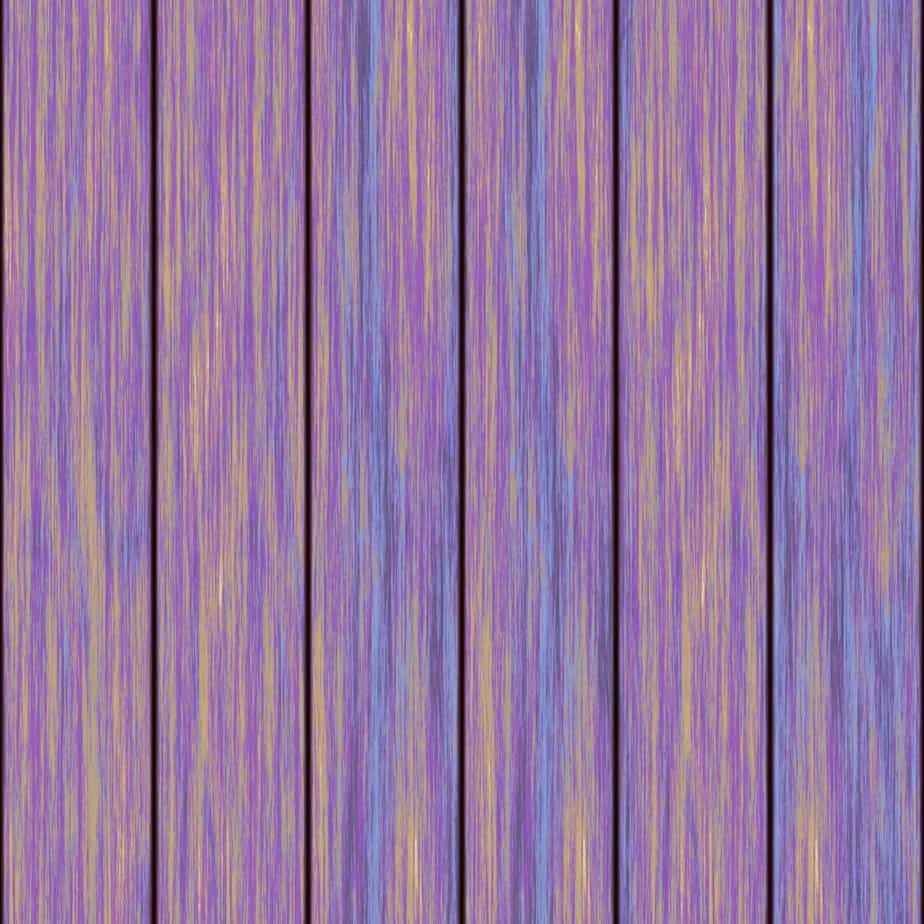 A mix of purple and blue paint wooden fence