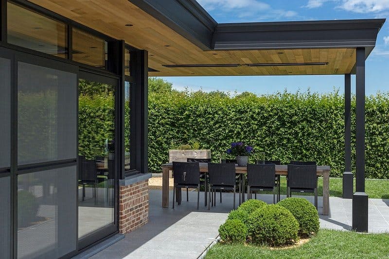 Modern veranda furnished with outdoor dining set
