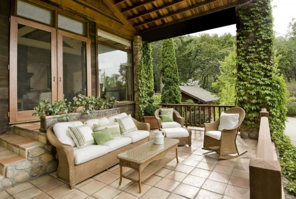 Porch entertaining area with woven rattan furniture