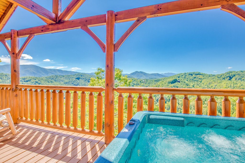 Outdoor hot tub with a mountain view