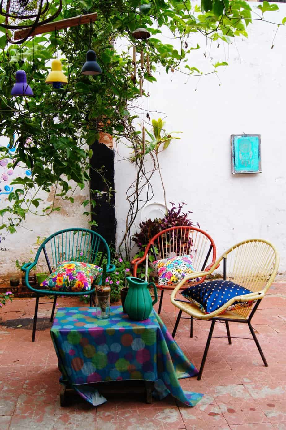 Colourful garden chairs in green, red and yellow colours