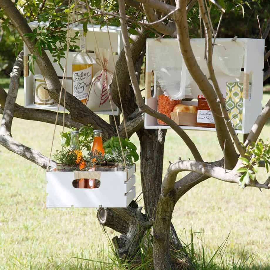 DIY hanging crates on trees for storage
