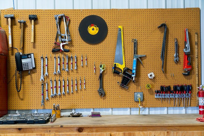 Shed workshop pegboards with DIY hand tools