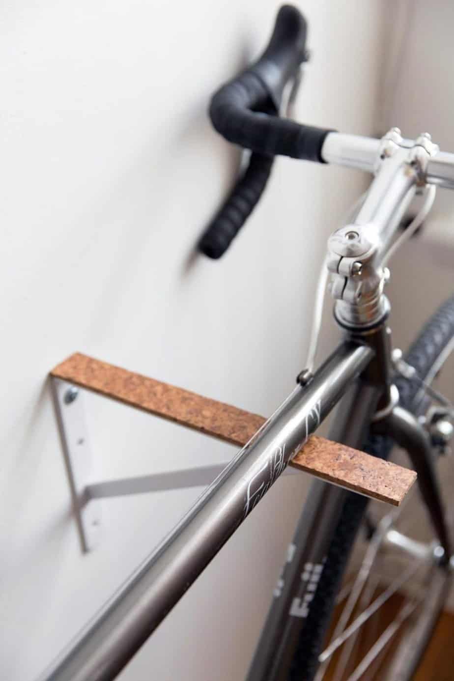 A bike suspended on a shelf bracket