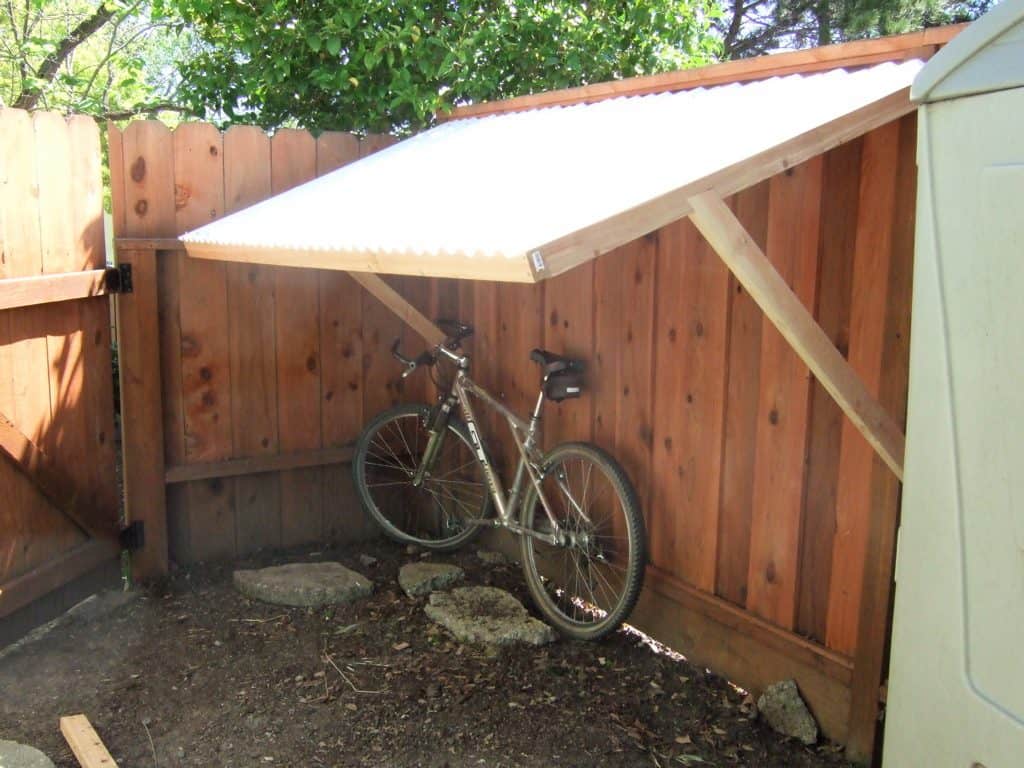 Cedar fence supported bike cover