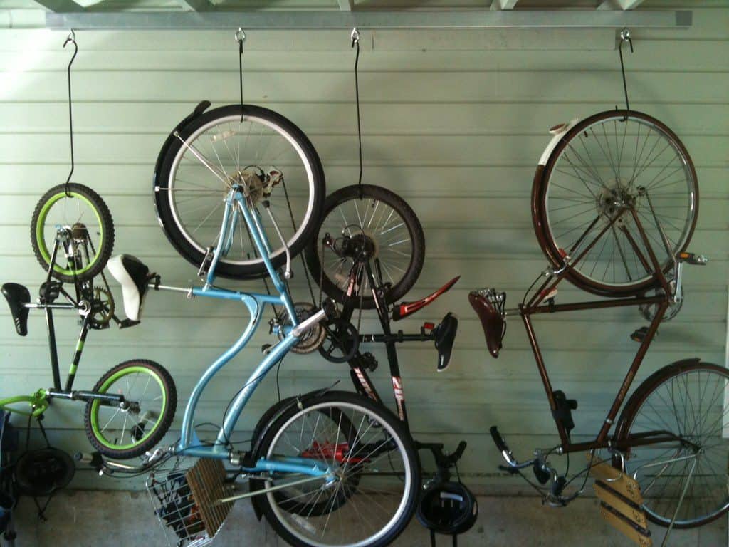 Bike suspended on the ceiling with hooks