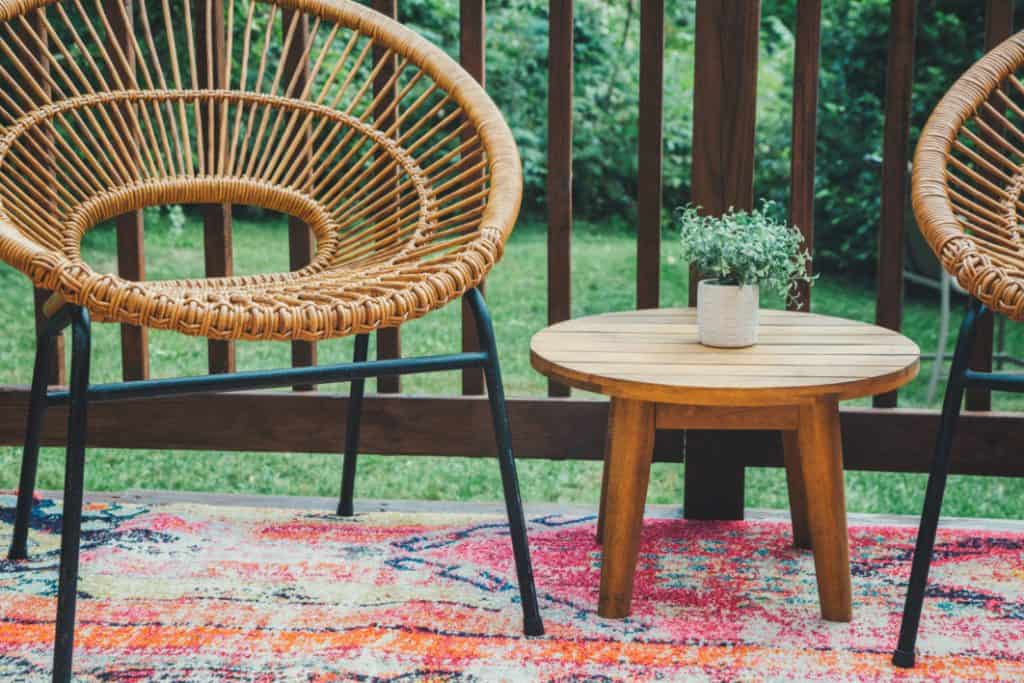 Rattan chairs with matching coffee table on deck