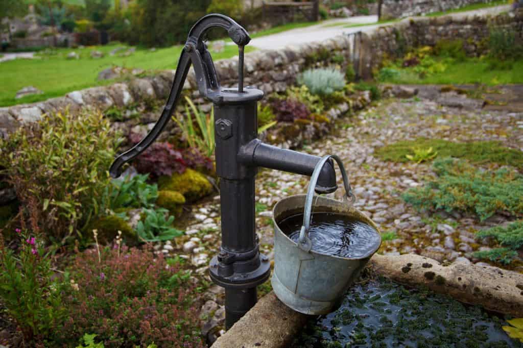 Old water pump for a mini pond