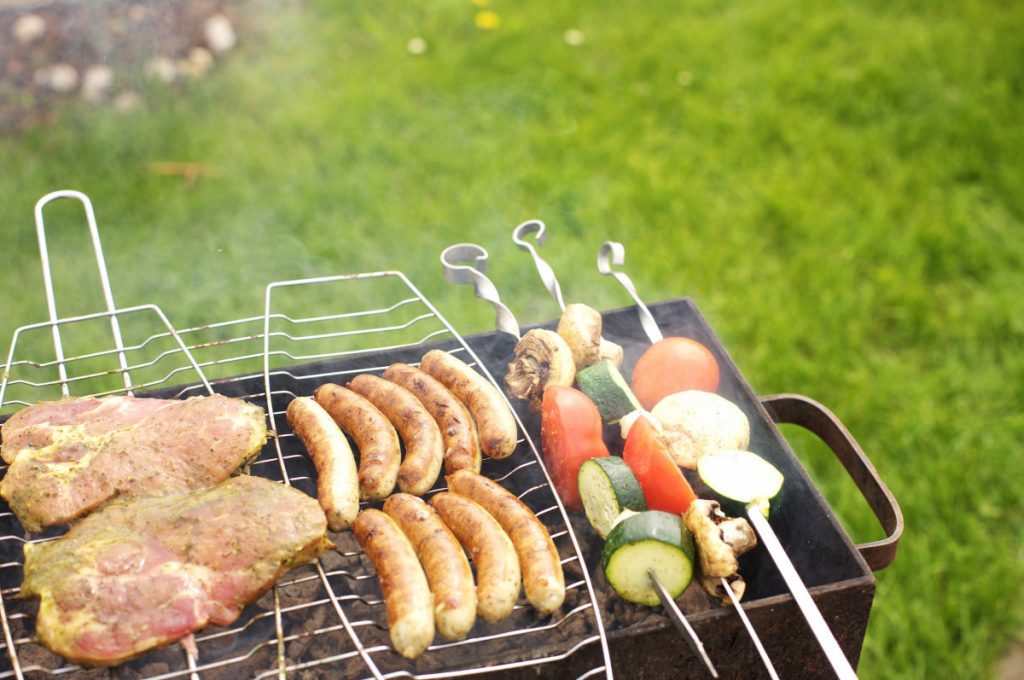 Meats, sausages and skewers on the grill