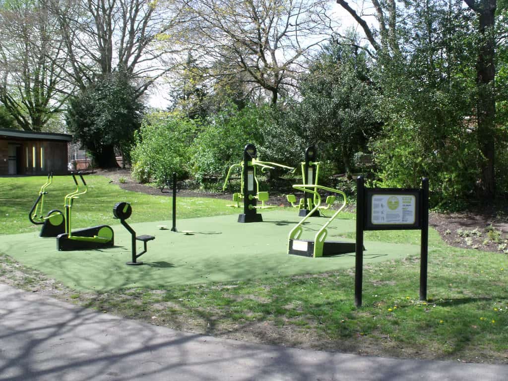 Outdoor gym with various exercise equipment set against the scenic backdrop of Dorchester, the county town of Dorset.