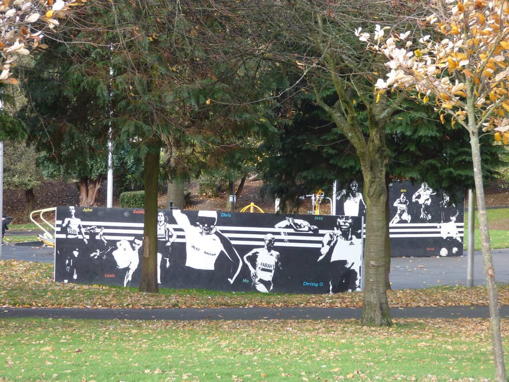 Outdoor gym in Victoria Park, Smethwick, featuring a mural honouring British Olympic heroes.