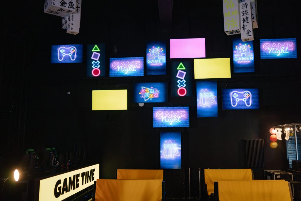 Neon signages inside a computer gaming shop