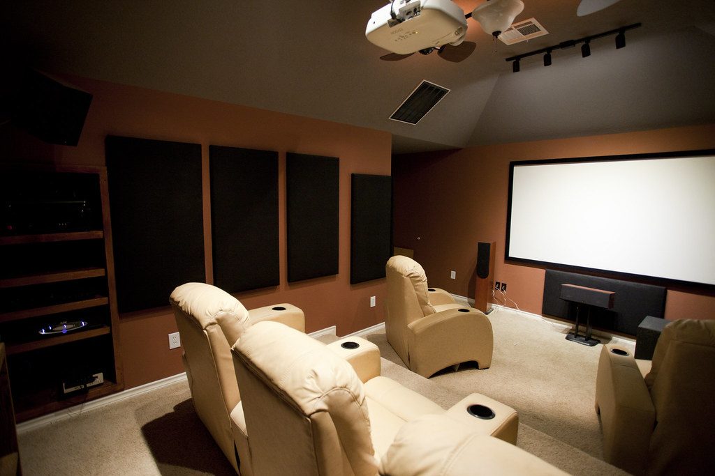 Home theatre with a built-in equipment rack as well as removal of the rear-room projector mount