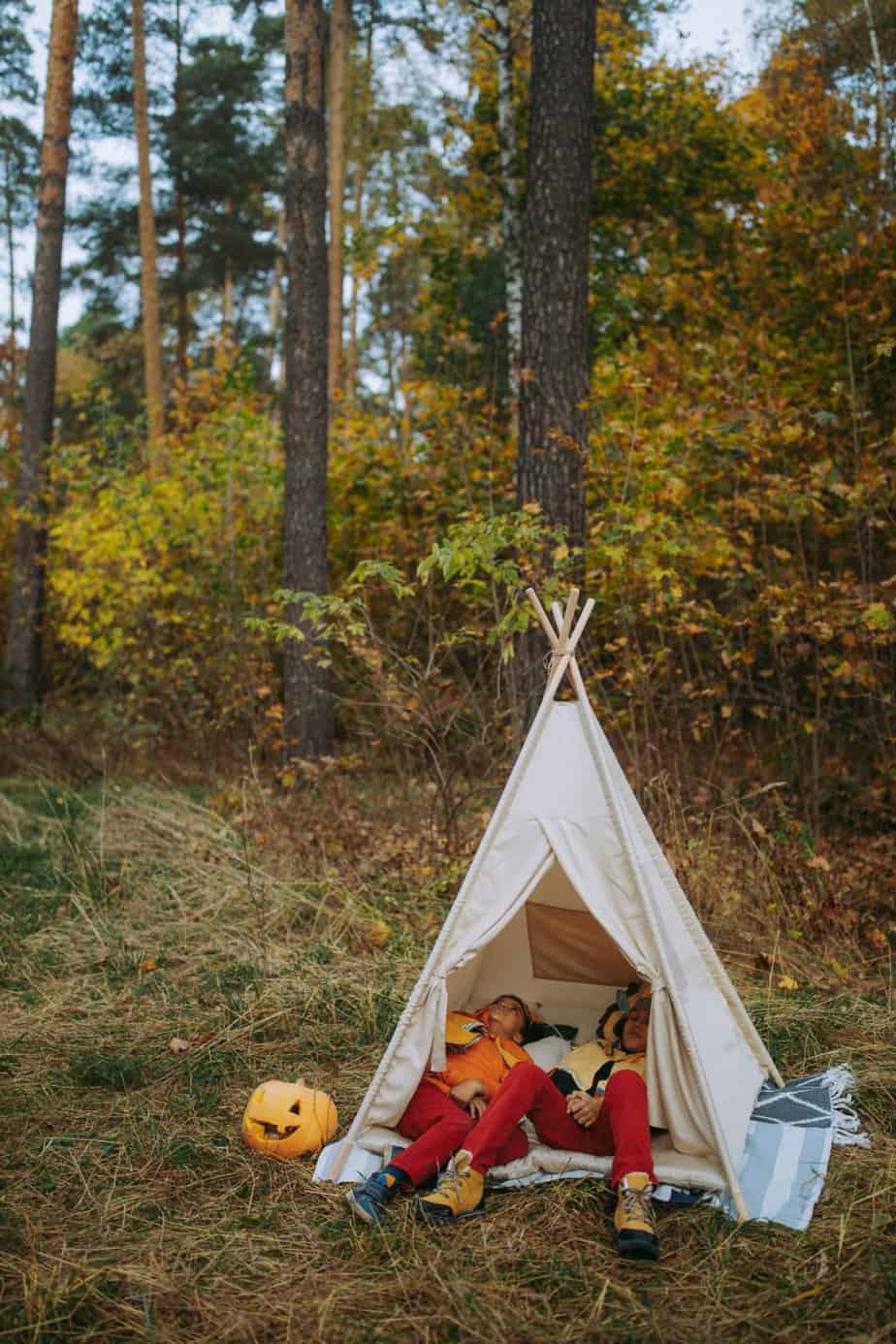 Children in a teepee hideout