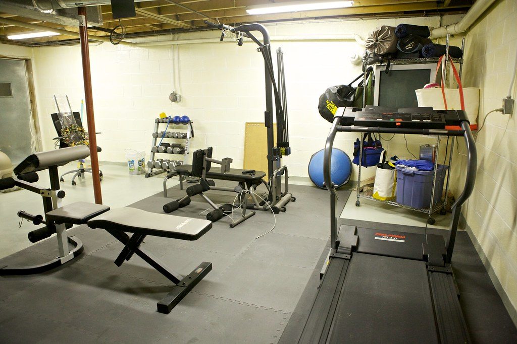Basement gym setup with treadmill