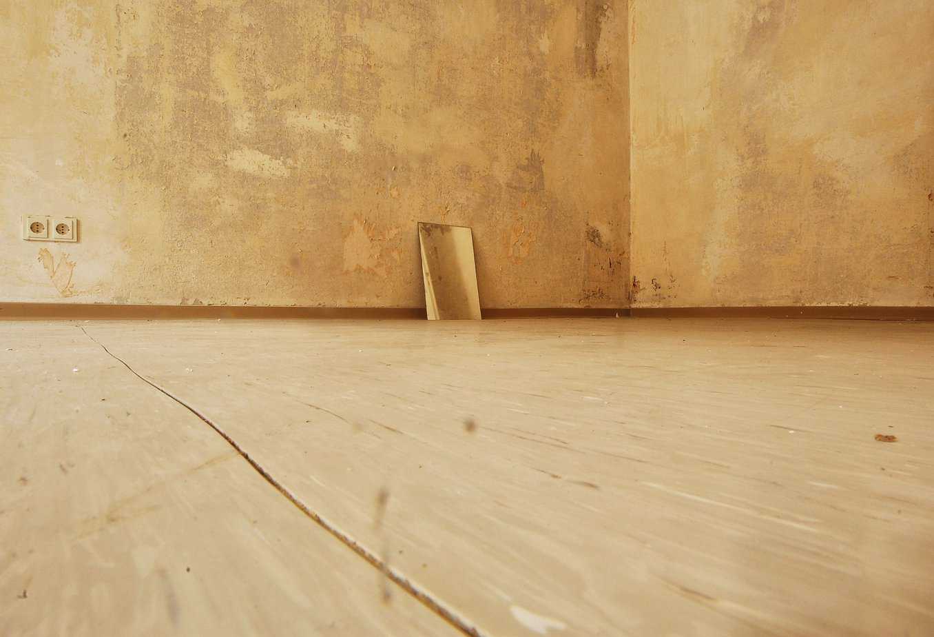 Gaps and cracks found in a log cabin floor