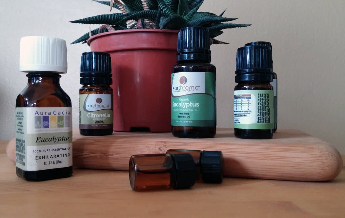 Various essential oil bottles including eucalyptus and citronella