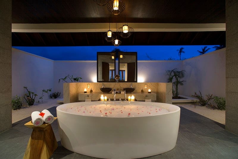 Luxurious outdoor bathroom with bathtub