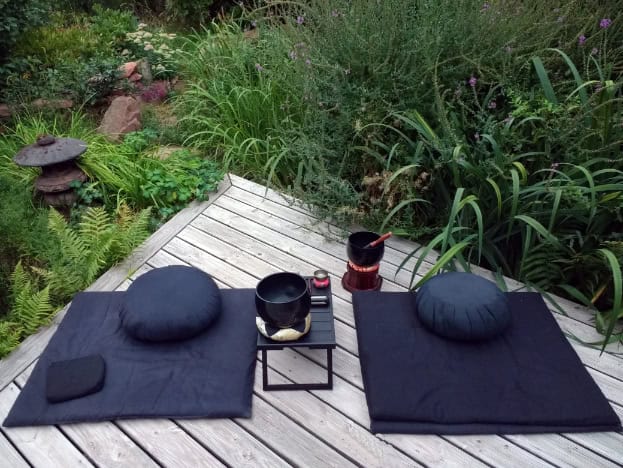 Meditation deck setup in the garden.