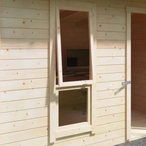 A log cabin with an awning window