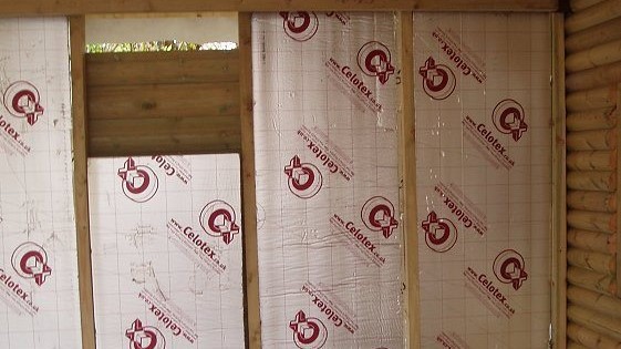 Celotex insulation boards in between shed wall studs