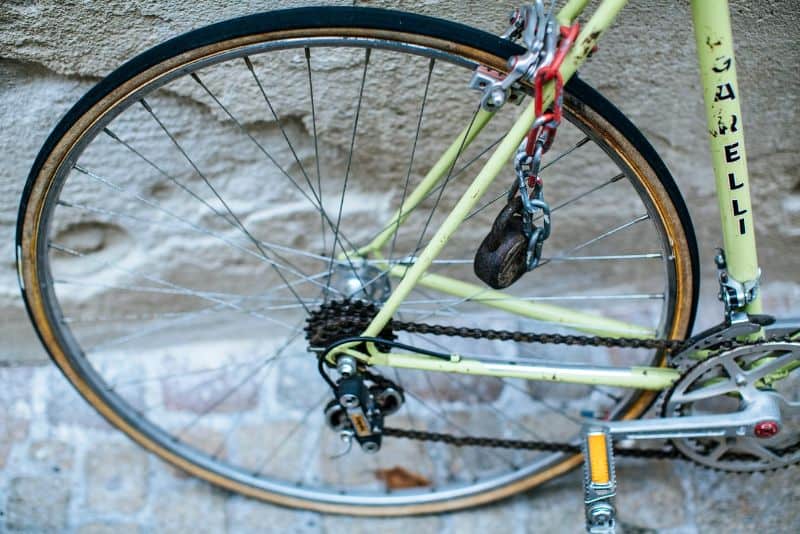 bike wheel and front part of frame against cobbled street