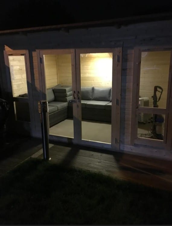 Lit up exterior of Ian's BillyOh Carmen summerhouse